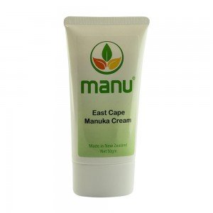 Bote con la inscripción de Crema de Manuka Bote con la inscripción de Crema de Manuka